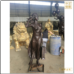 商場(chǎng)門(mén)前購(gòu)物人物雕塑